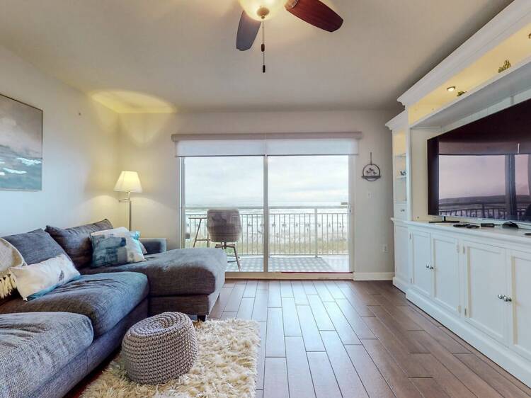 Pelican Isle 210: Modern Beachfront Condo