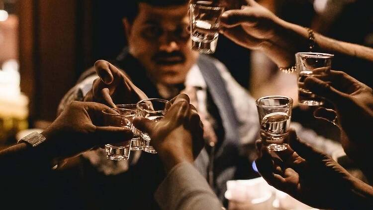 Roll eyes at hearts while sipping bold drinks at El Cupido Stupido's carefree event