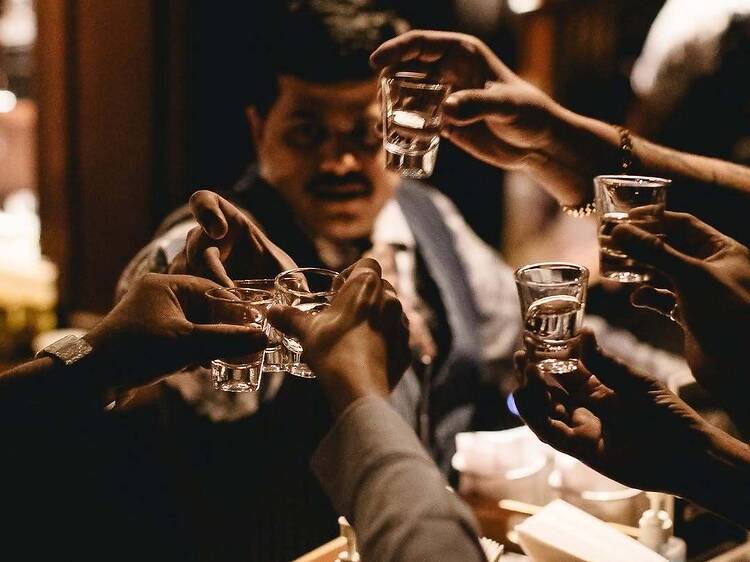 Roll eyes at hearts while sipping bold drinks at El Cupido Stupido's carefree event