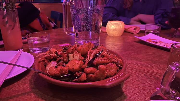 A bowl of fried vegetables at Spicy Moon