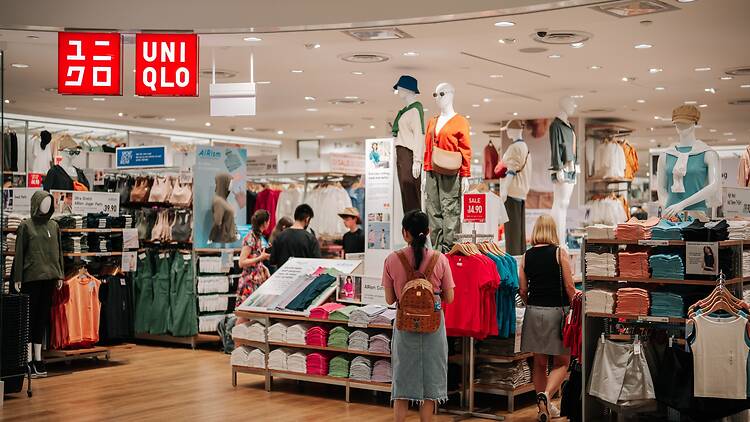 Singapore - July 31, 2023 : Entrance to Uniqlo store in Orchard rd, Singapore. Uniqlo Co., Ltd. is a Japanese casual wear designer, manufacturer and retailer.