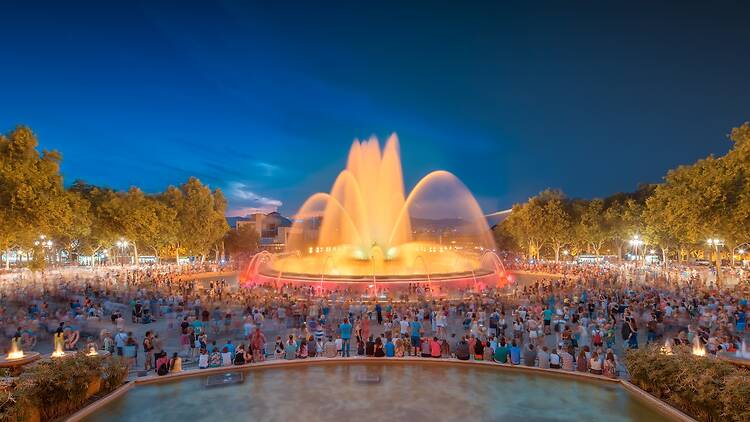 night view of Magic Fountain light show in Barcelona, Spain