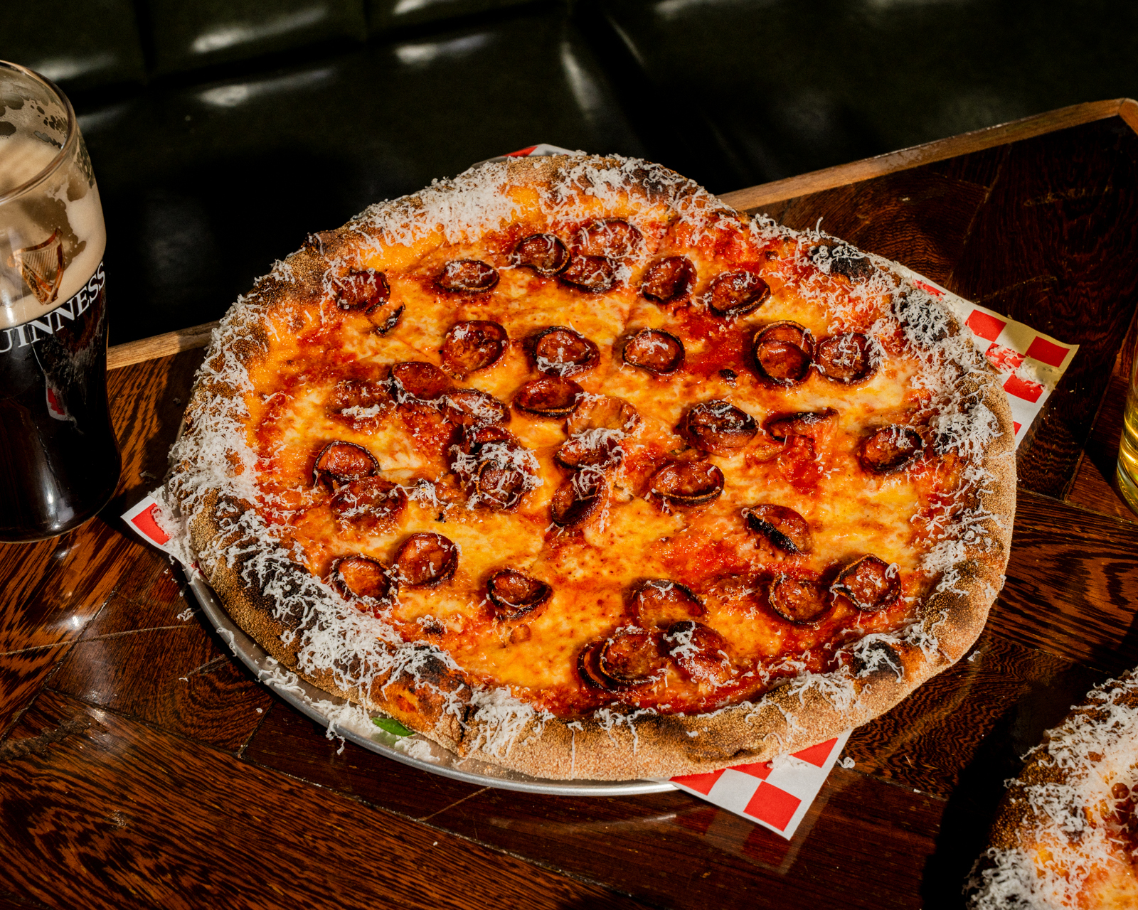 Pepperoni pizza with generous parmesan shavings 