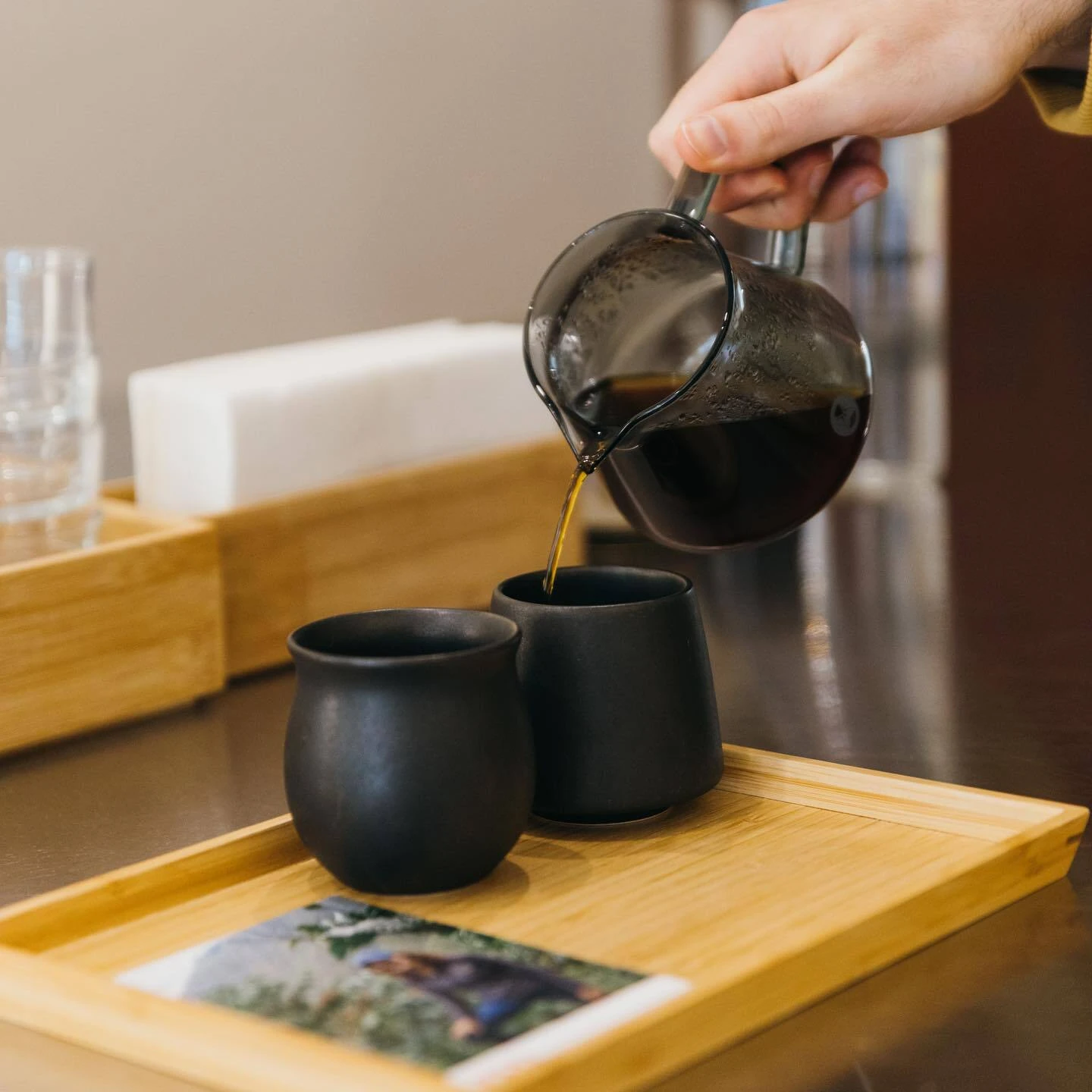 Pouring two cups of coffee