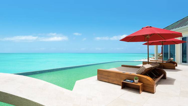 The Classic Caribbean: White-Walled Luxury Cottage The Classic Caribbean: White-Walled Luxury Cottage