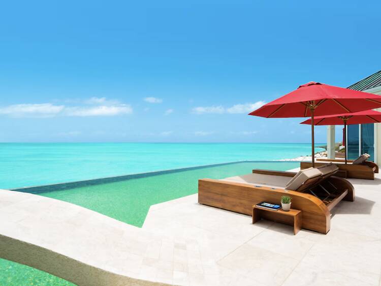 The Classic Caribbean: White-Walled Luxury Cottage The Classic Caribbean: White-Walled Luxury Cottage