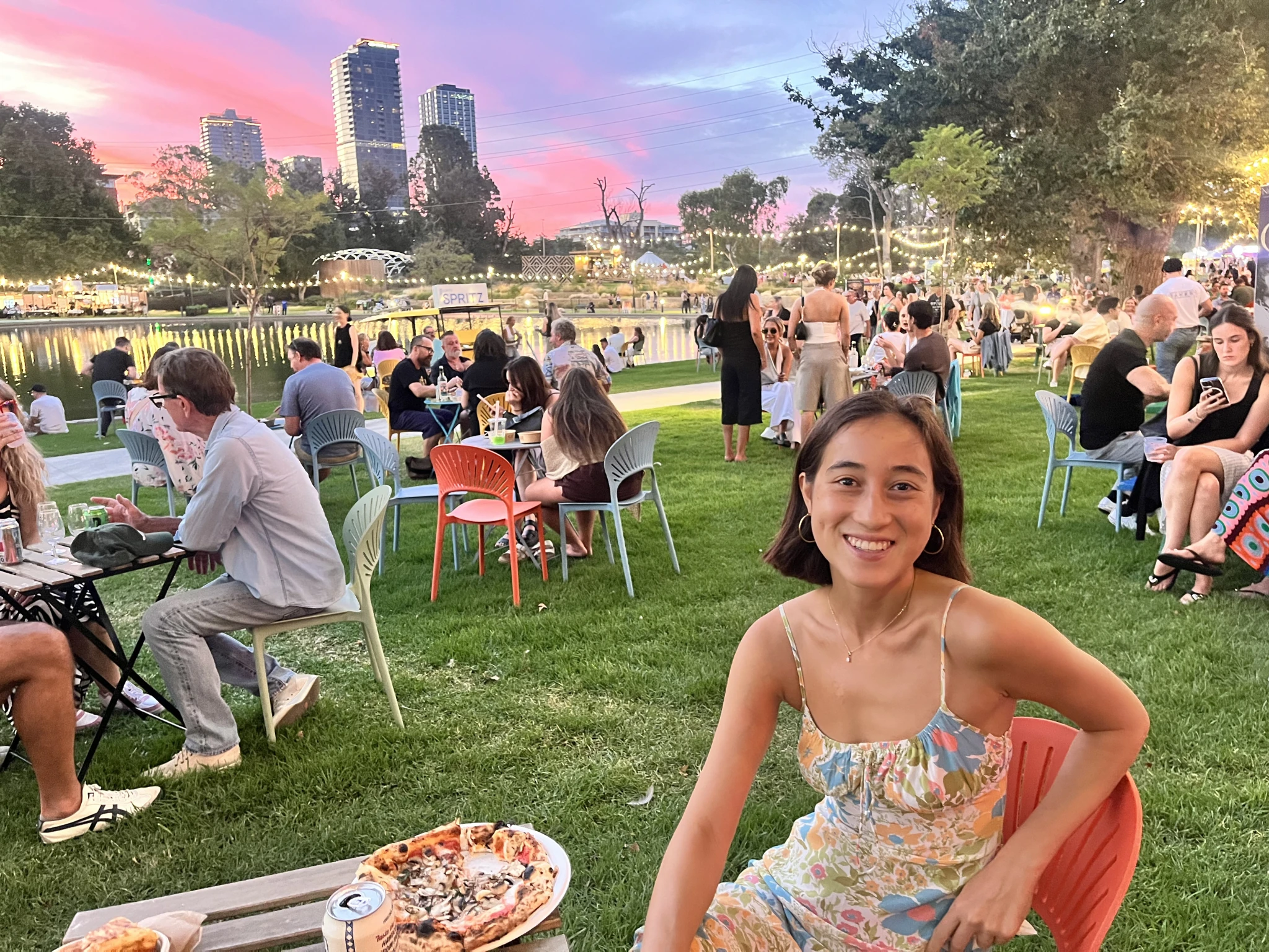 Girl eating on grass
