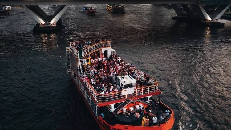 Sail the Chao Phraya with horns and Singha at Viking Boat Party