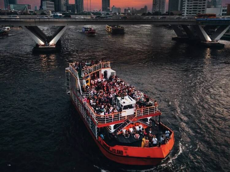 Sail the Chao Phraya with horns and Singha at Viking Boat Party