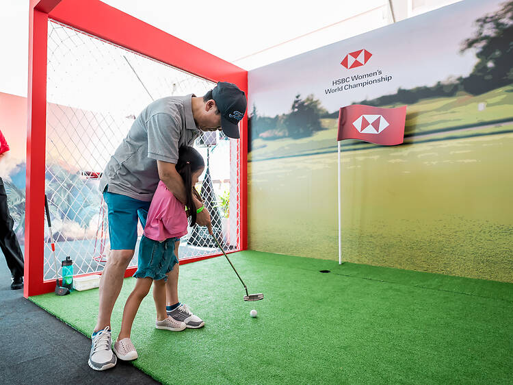 2. Experience the festival vibes of the Fan Village