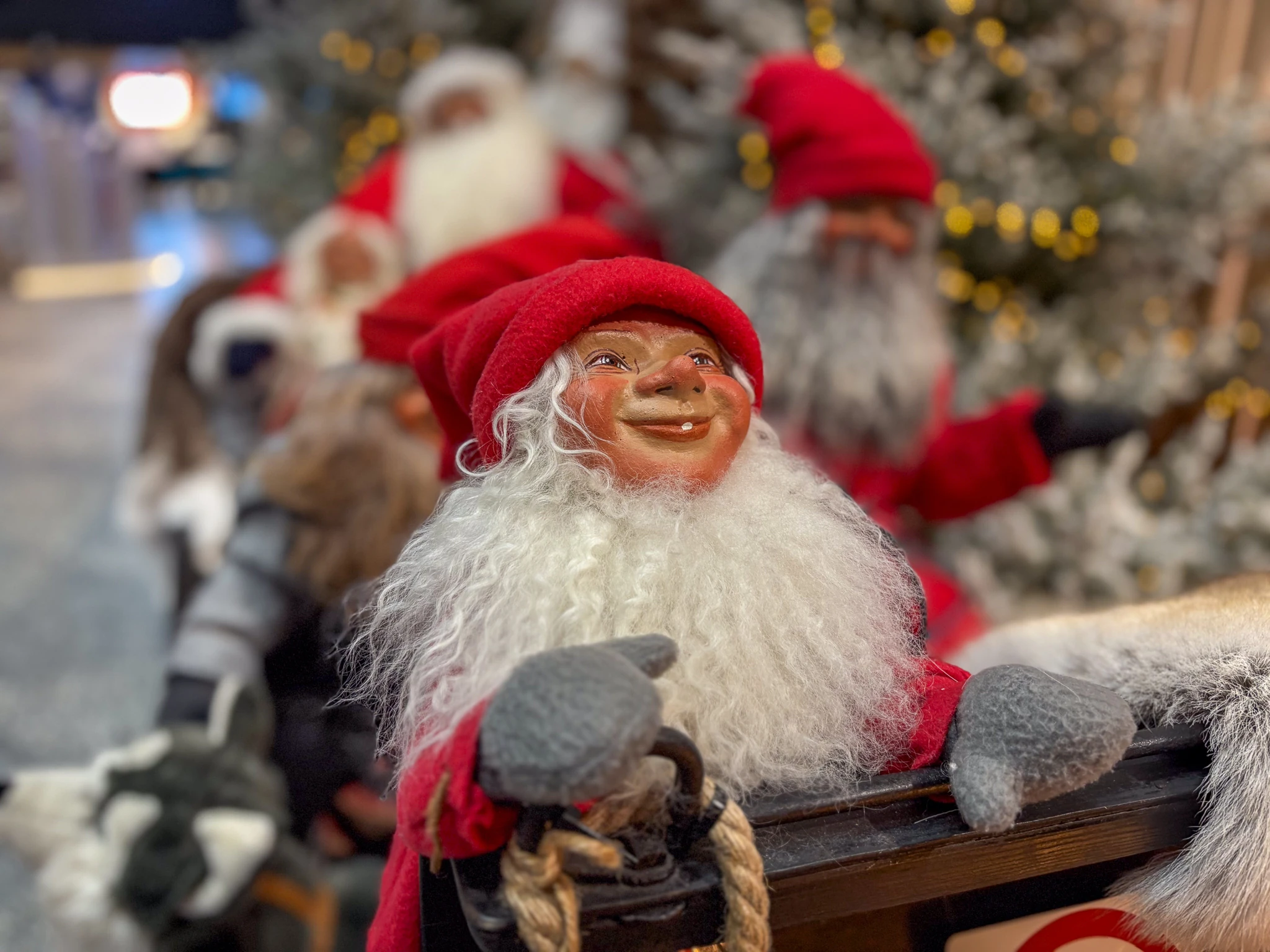 statue of a christmas elf at the helsinki airport