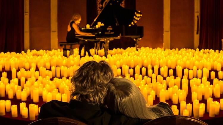 Couple enjoying a candlelight concert
