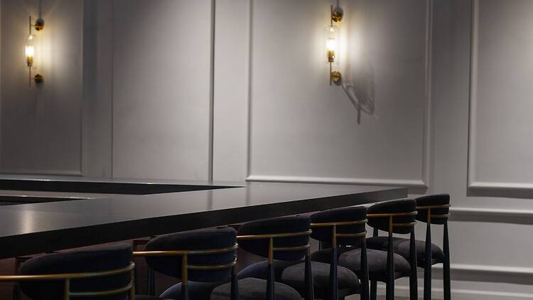 A black marble counter at Restaurant Yuu