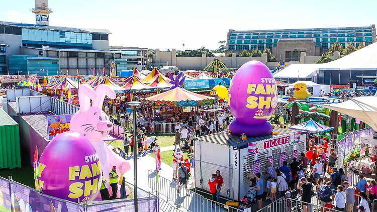 Ingenia Holiday Parks Sydney Family Show An easter carnival with rides, giant inflatable bunnies and crowds of people