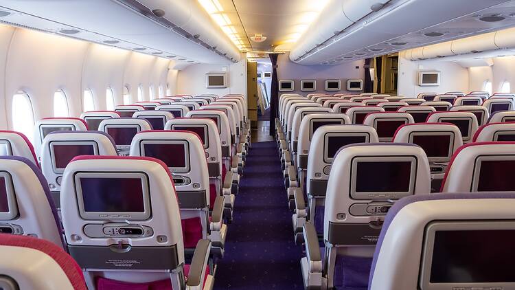 Airplane economy class seat of aircraft cabin interior when fly Airplane economy class seat of aircraft cabin interior when fly