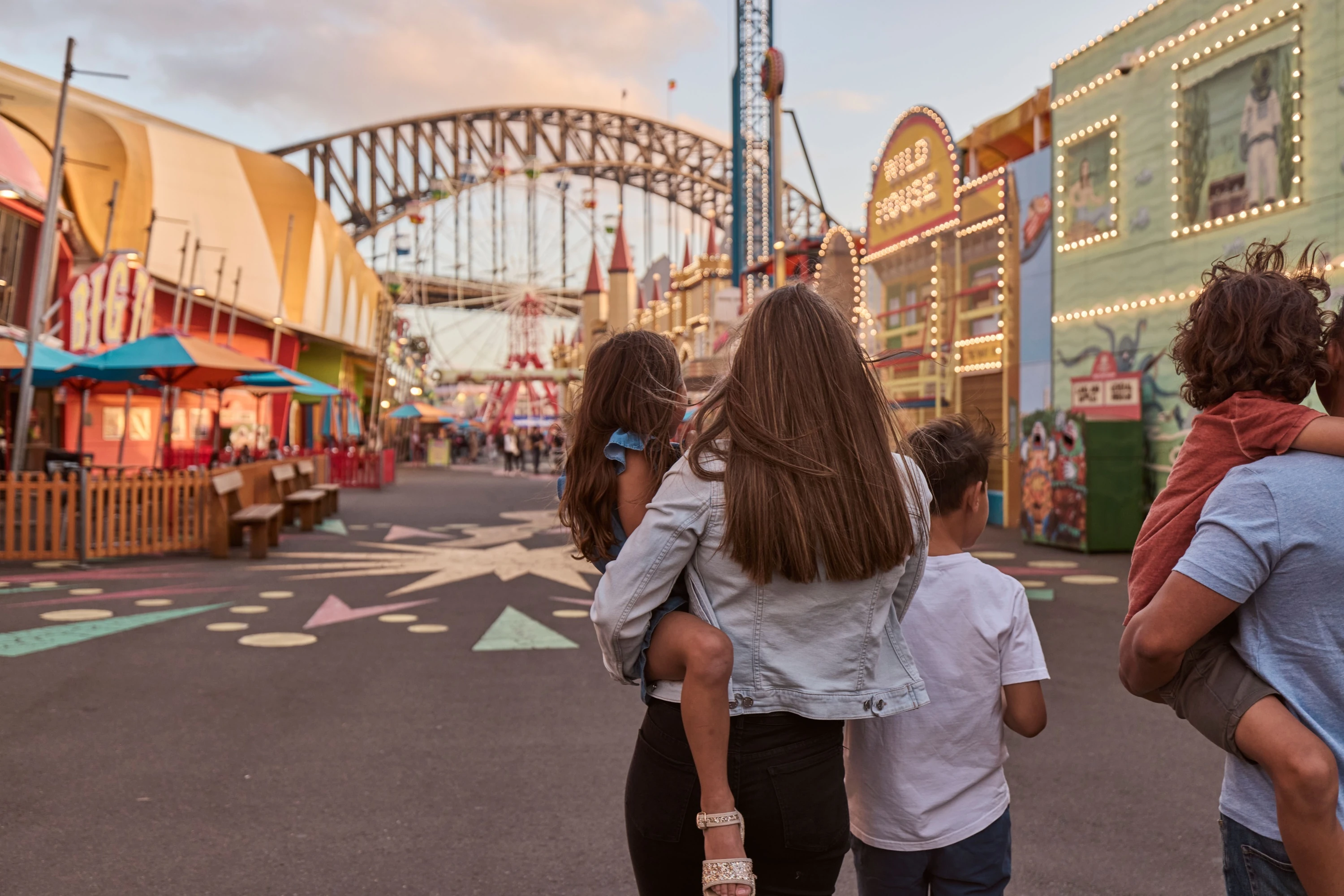 Family enjoying a day out at Luna Park Sydney, Milsons Point