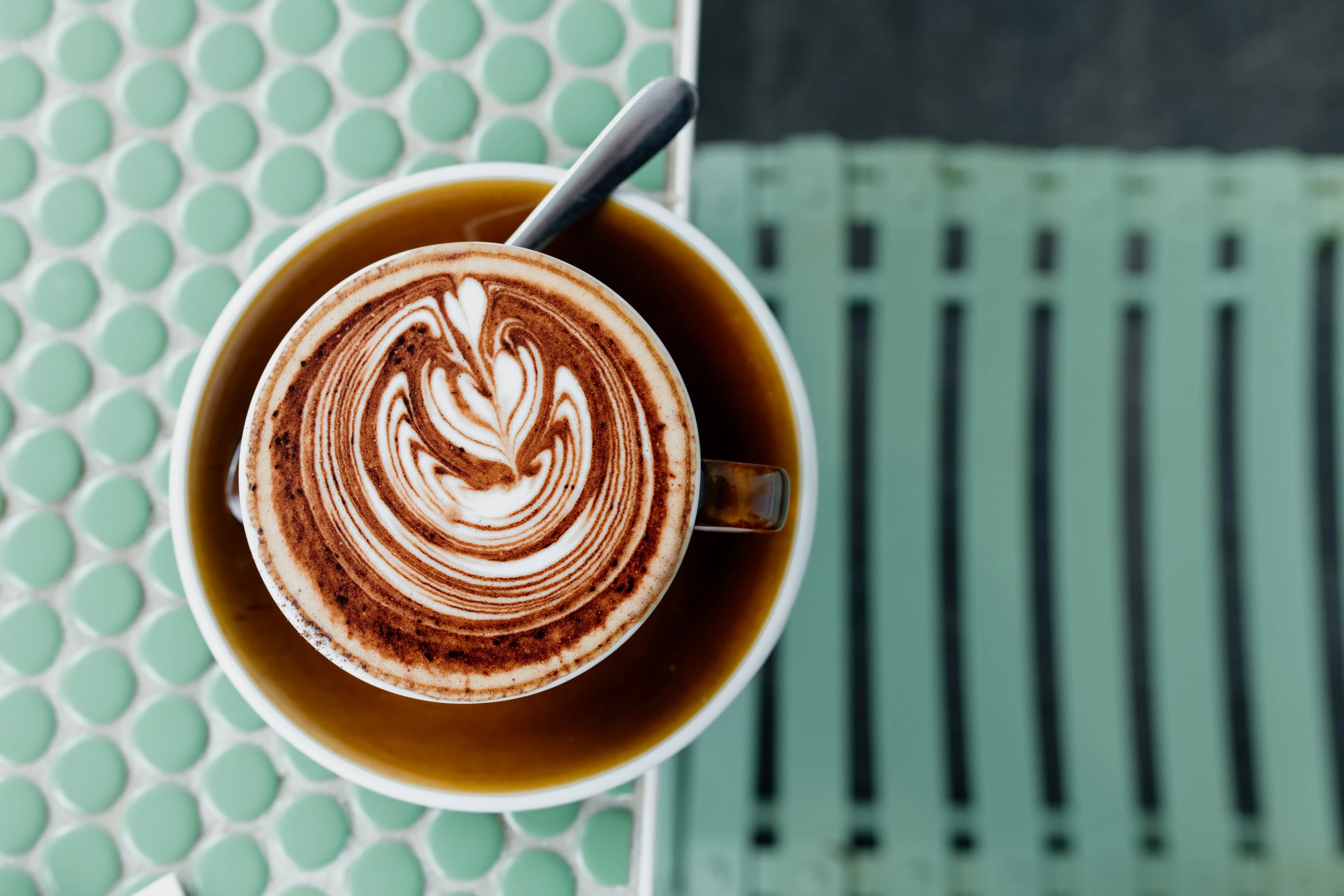 Coffee on green table
