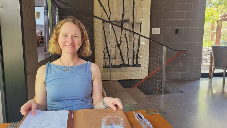 A woman sitting at a table