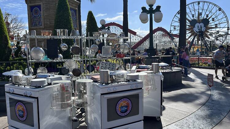 Pots and pans set up for a performance at the Disney California Adventure Food & Wine Festival.