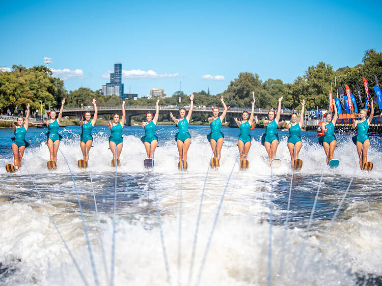 Moomba Festival A row of water skiers on the Yarra River for Moomba.