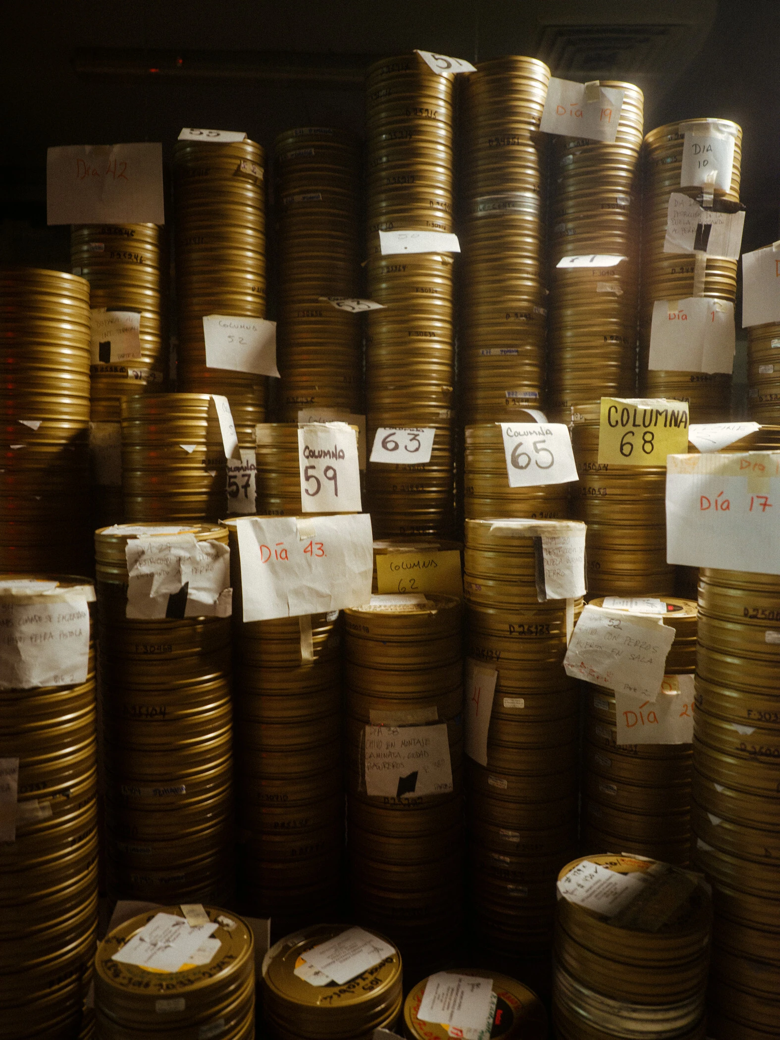 Film reels stacked in the making of &ldquo;Sue&ntilde;o Perro&rdquo;