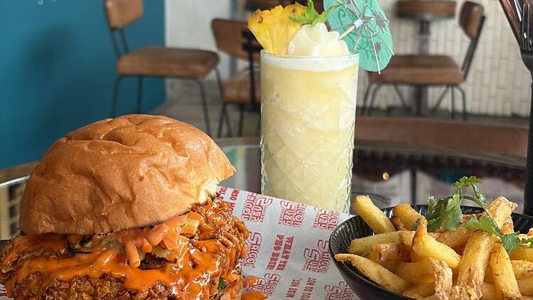 Saigon Suzy kung pow mu'clucker fried chicken burger, chips and mocktail