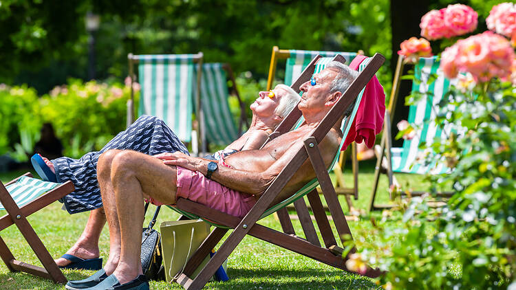 Elderly people on sun loungers in London’s Regent’s Park