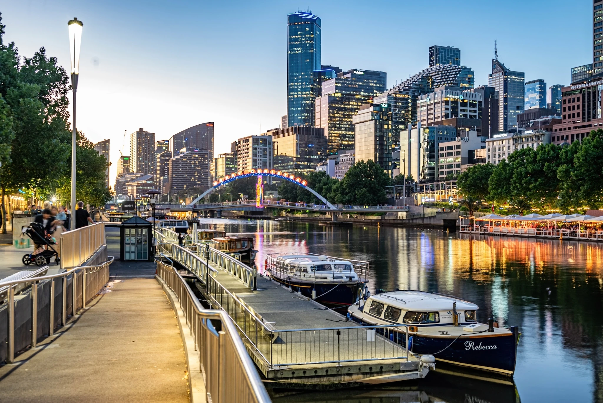 Boats on the Yarra River along South Bank promenade, Melbourne's fashionable riverside district