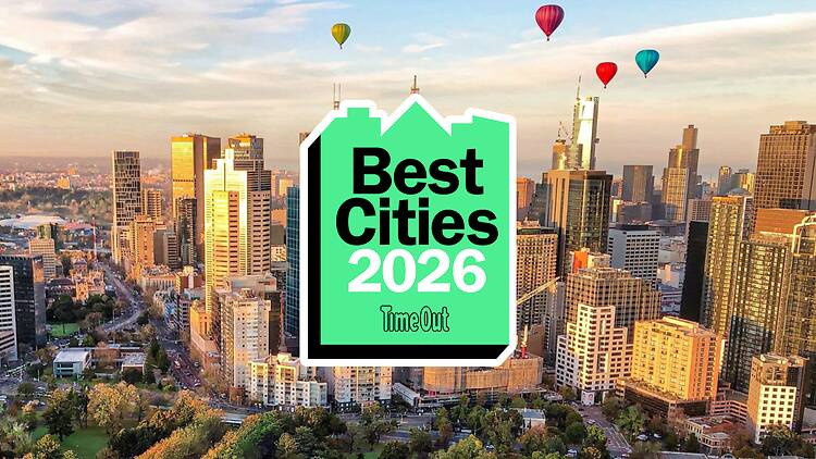 An aerial skyline shot of Melbourne, with a graphic over the top.