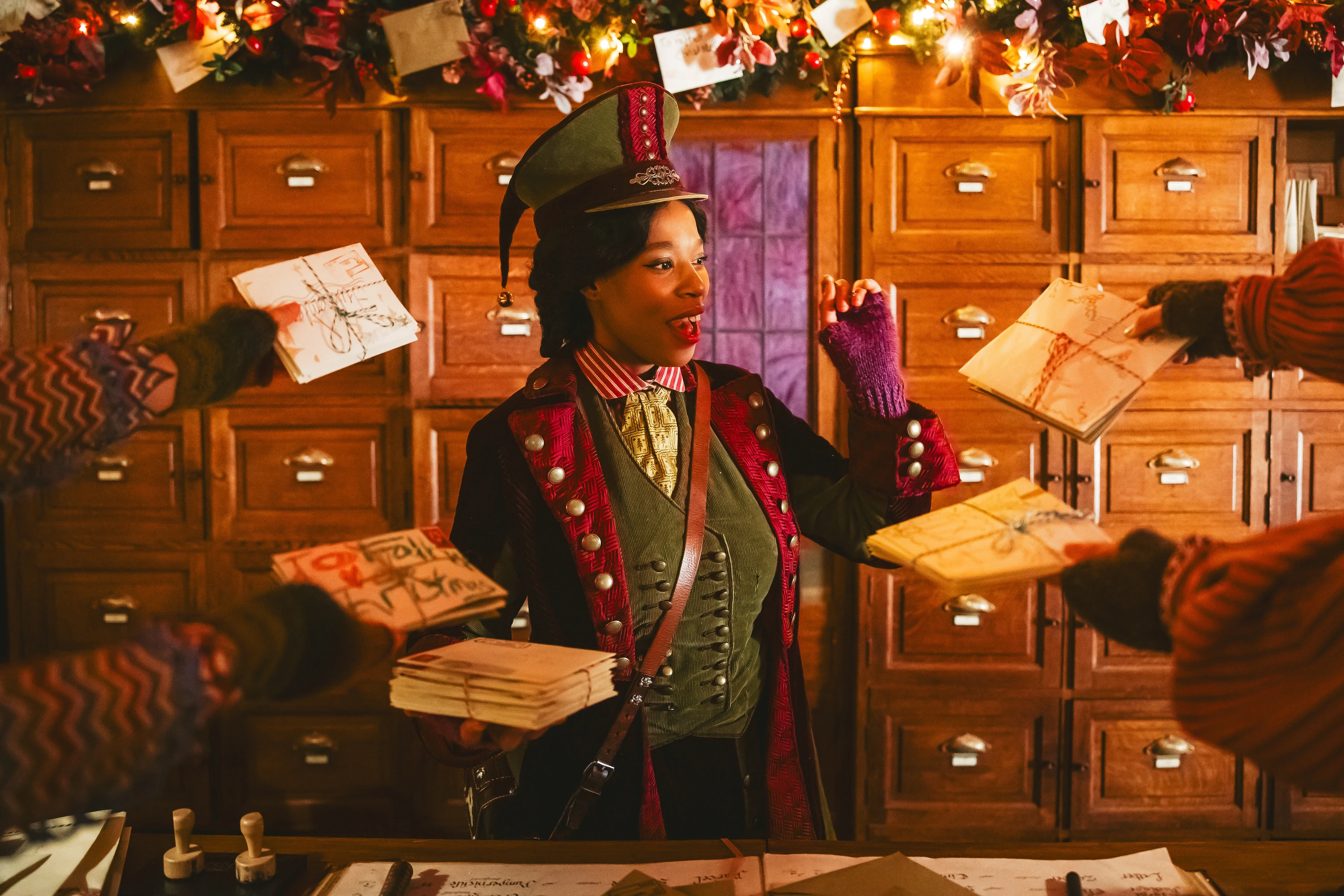 Festive elf sorting letters at Lapland UK