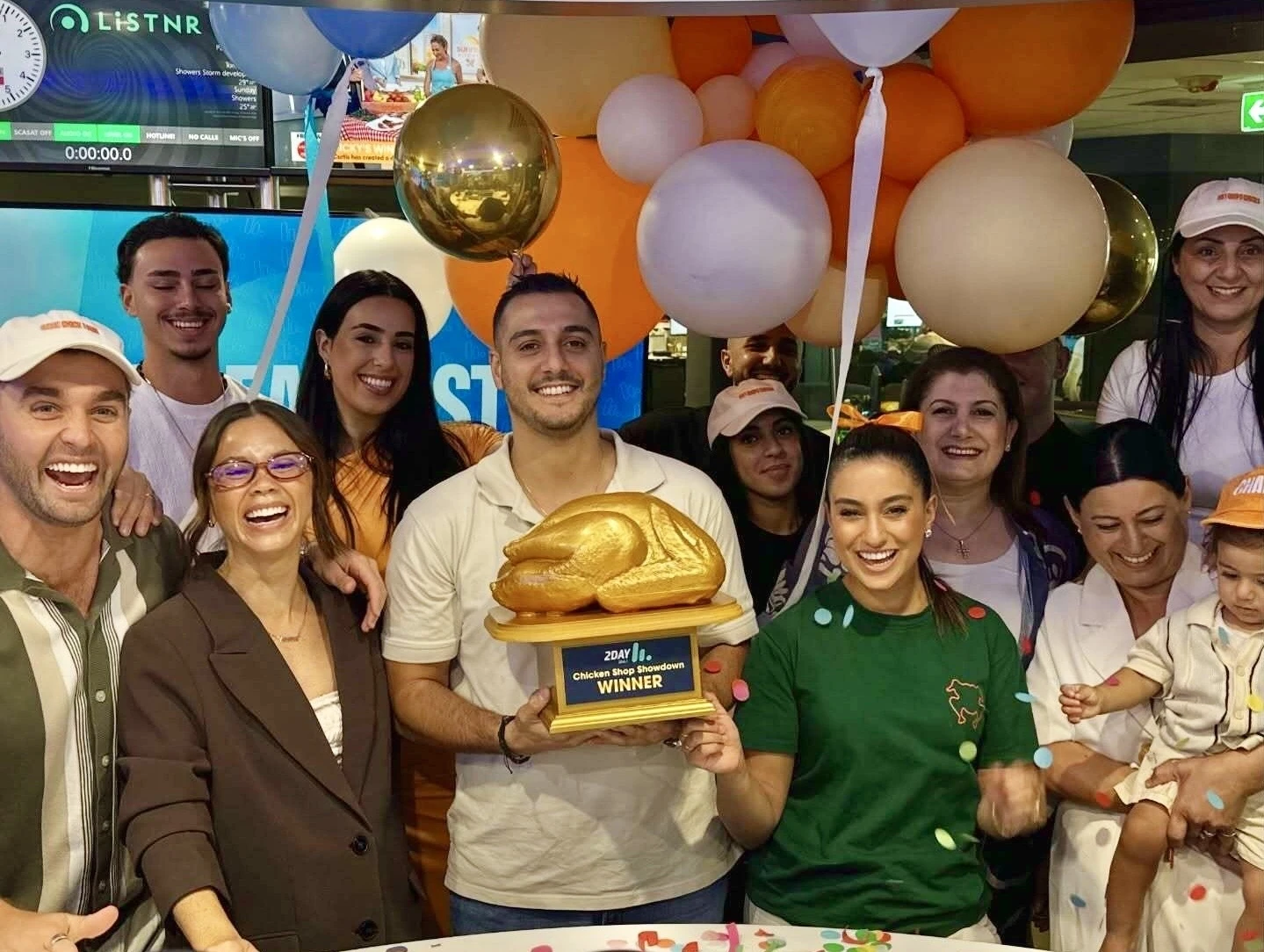 2Day FM hosts Nath and Emma with Char'd Chicken team for the best charcoal chicken contest