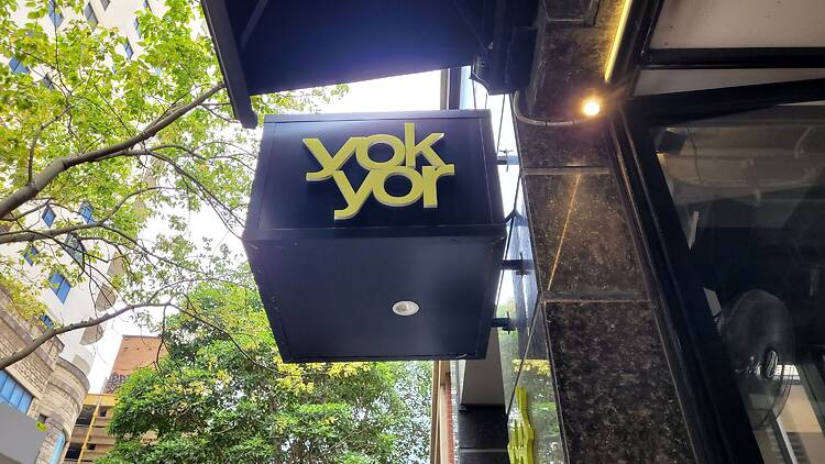 A restaurant sign that says yok yor