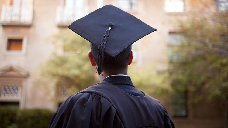 Thinking graduate, man or vision on university campus, college event or school graduation ceremony and future goals. Graduation cap, robe or student with education, learning or employment innocation