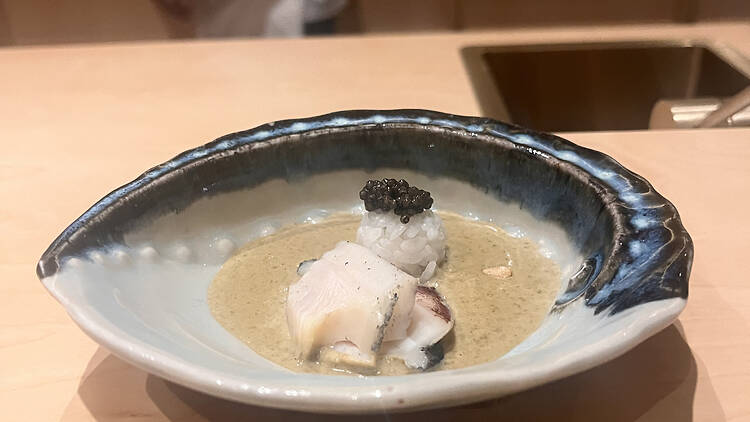 A dish served in an abalone shell at Matsu.