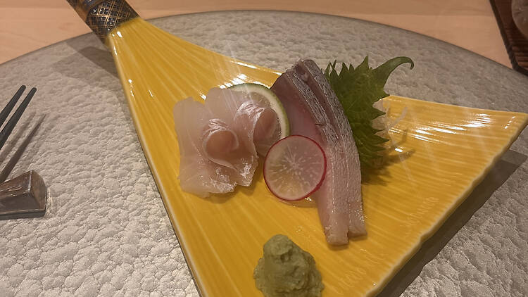 A yellow plate of sashimi at Matsu.