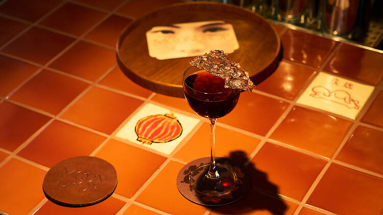 A cocktail on the bar at Moondrop.