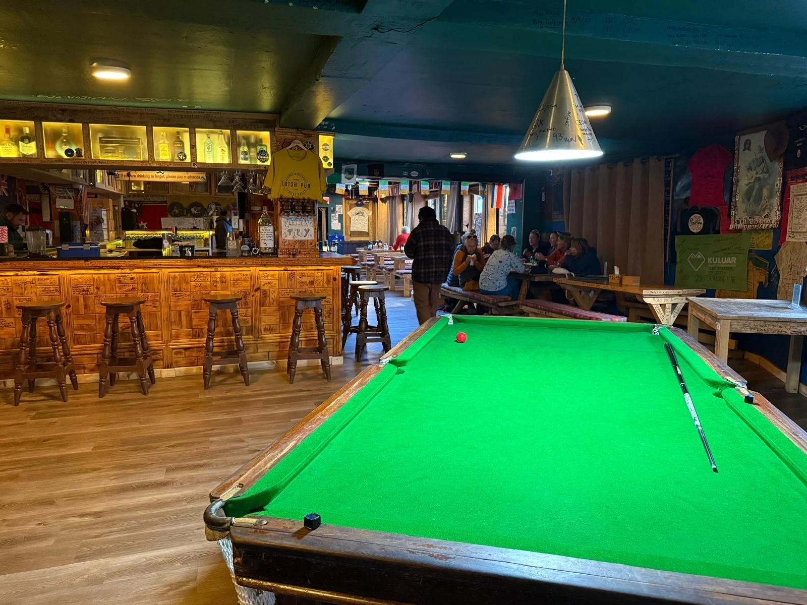 Inisde The Irish Pub in Namche Bazaar in Nepal, showing a pool table