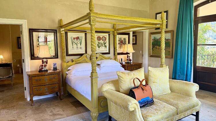 The French-inspired Huguenot Suite with its bold, four-posted bed.