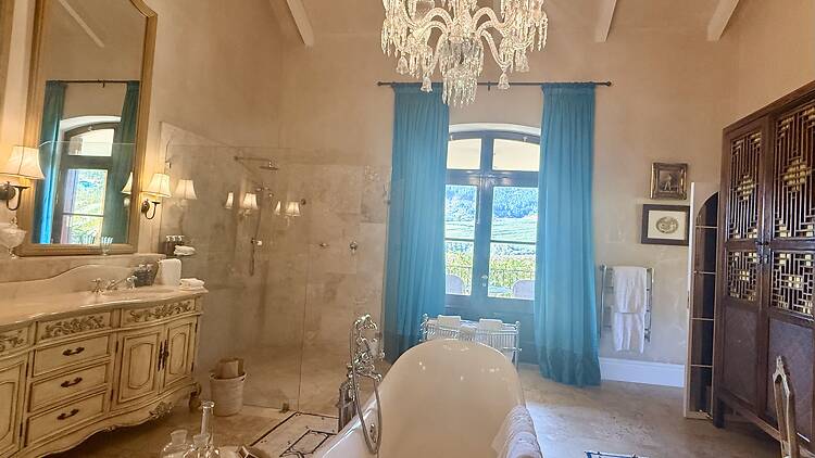 The expansive bathroom is perfect for indulgent relaxation.