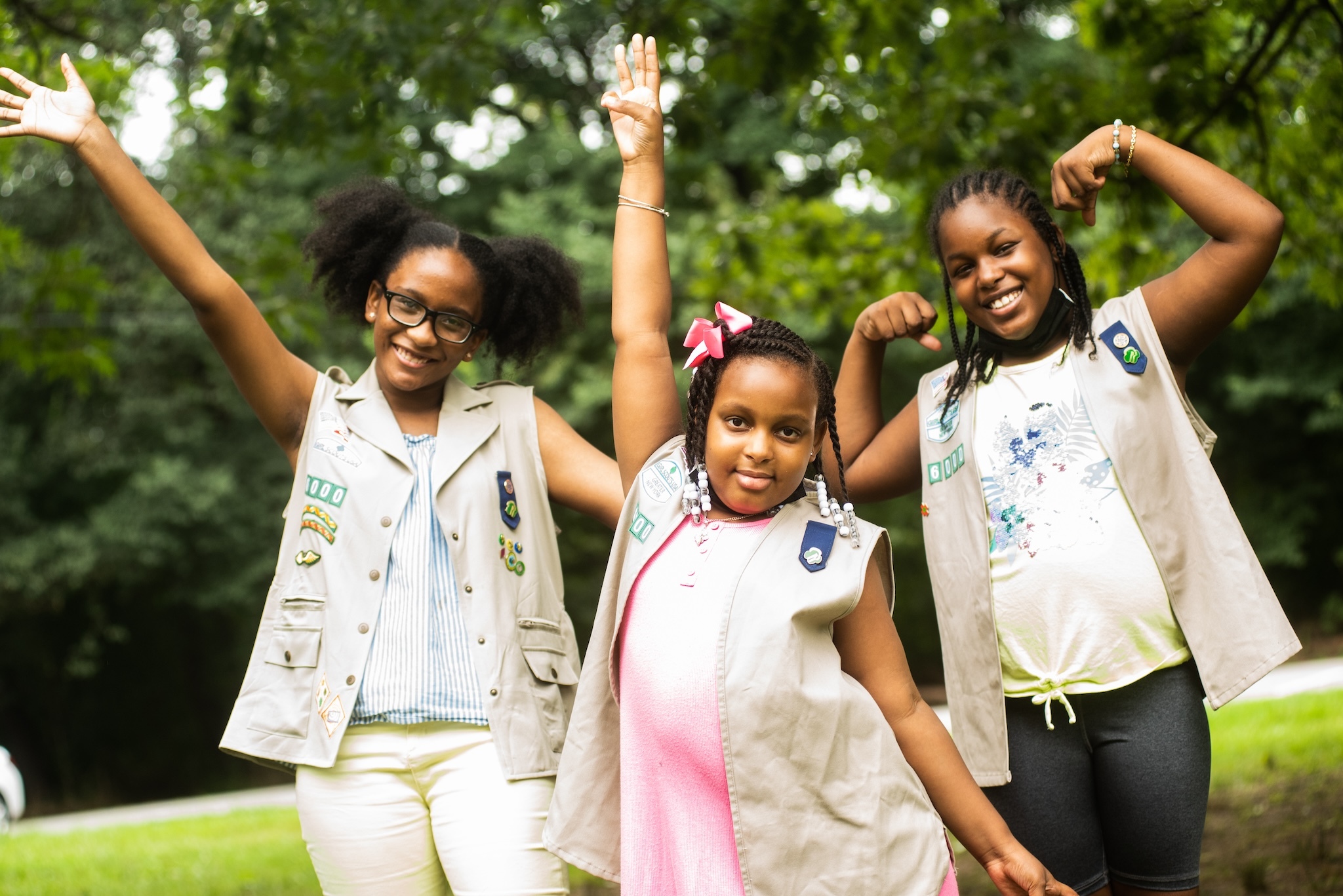 Three Girl Scouts posing for the camera