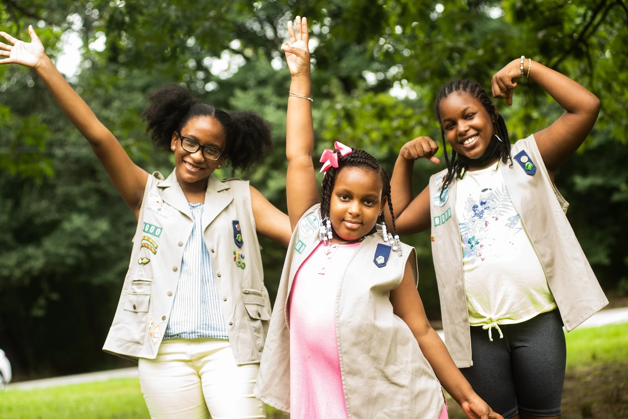 Three Girl Scouts posing for the camera