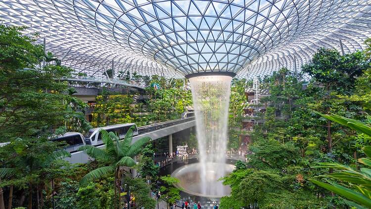 Singapore - Apr 9, 2023: Jewel Changi Airport is building is filled with attractions, indoor waterfall and tropical forest, shopping malls and dining area. The Vortex is the largest indoor waterfall
