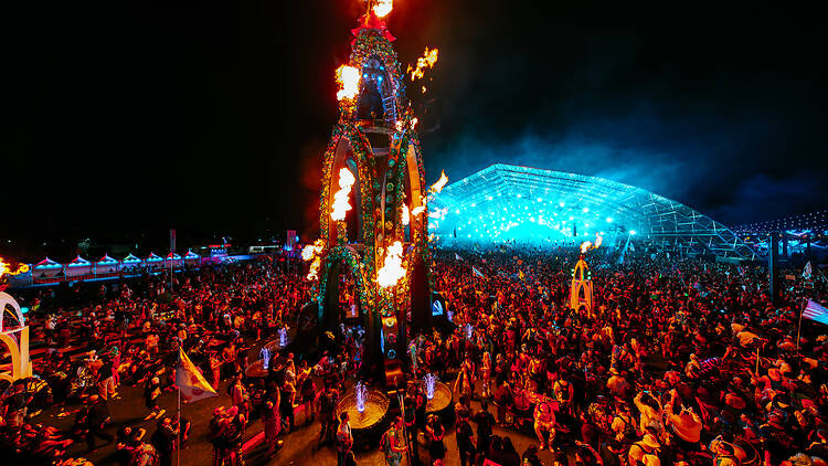 A flaming sculpture amid the crowd at Beyond Wonderland.