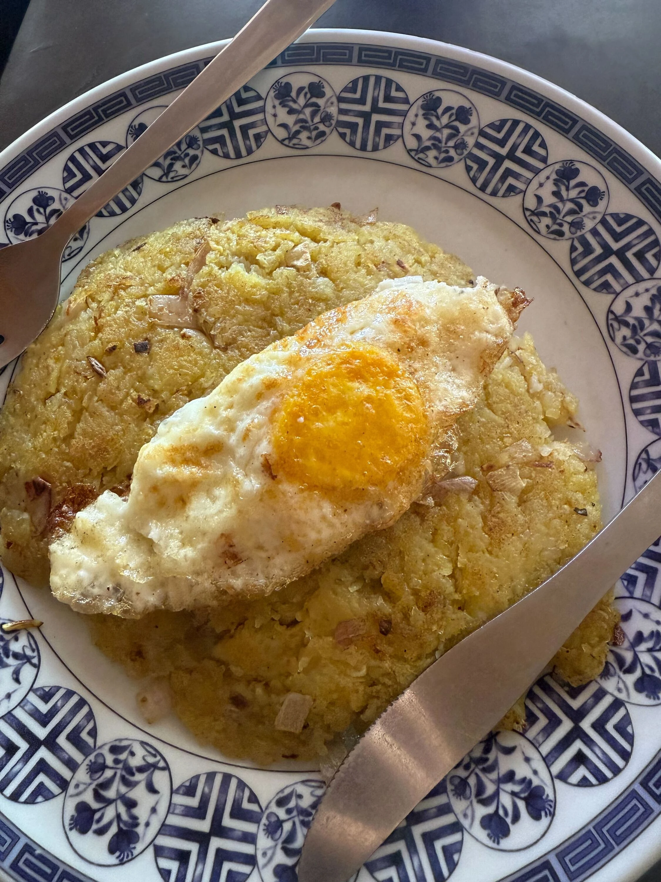 Fried potato rosti with egg breakfast