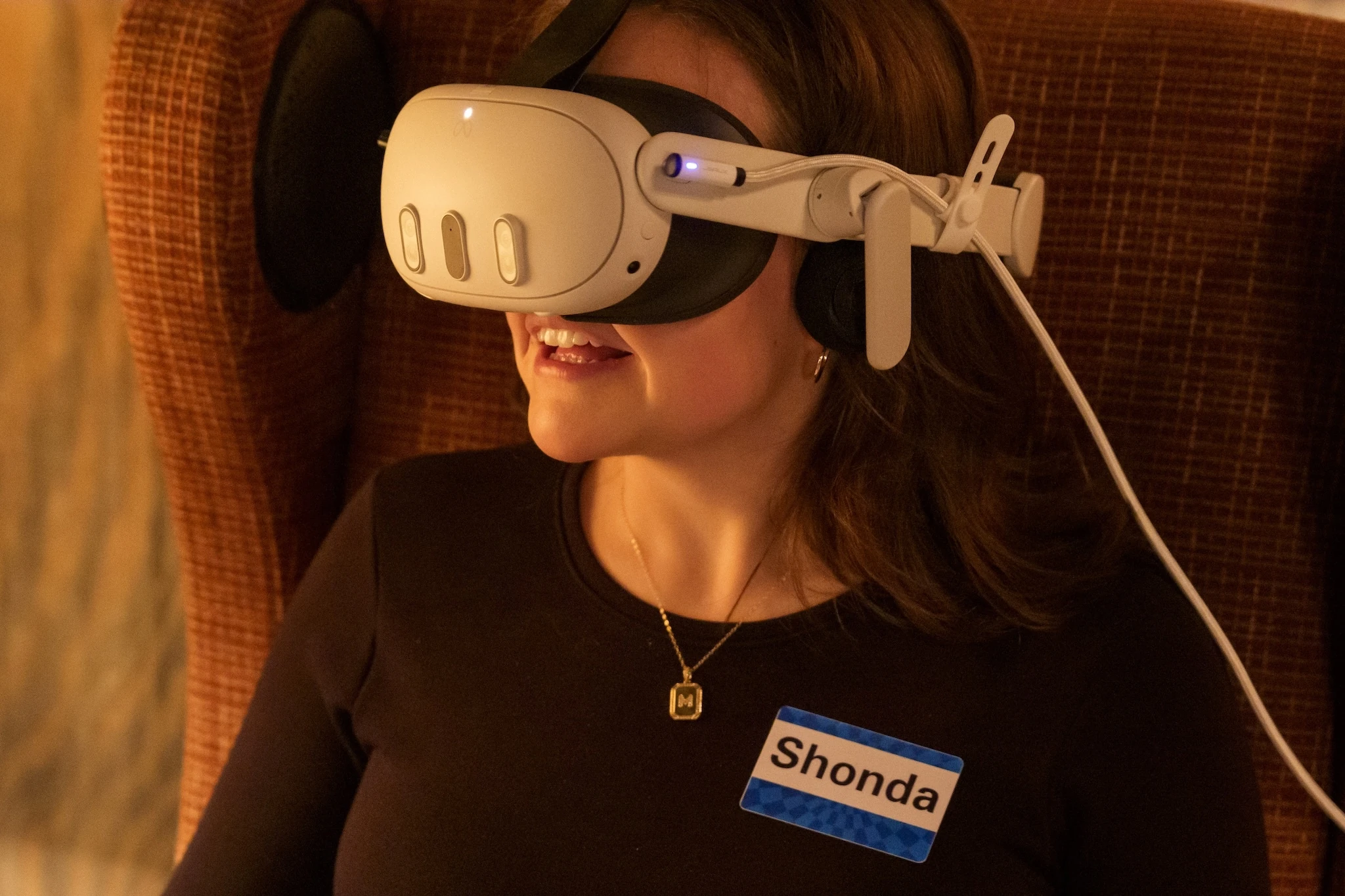 A 'Theater of the Mind' attendee wears a pair of VR goggles as part of the immersive theater experience.