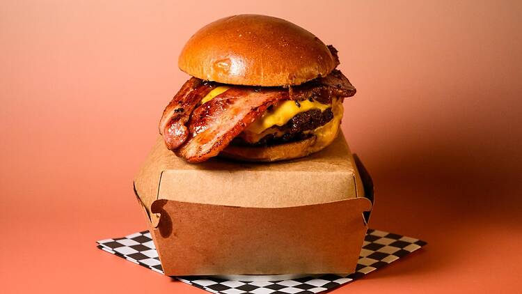 The Honest burger on a takeaway box