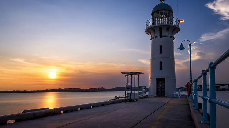 Soak in the tranquil vibes at Raffles Marina Lighthouse