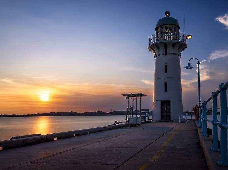 Soak in the tranquil vibes at Raffles Marina Lighthouse