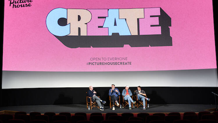 ‘The Ballad of Wallis Island’ Masterclass at Picture House Create 2025 Four panellists sit on chairs on the stage at Picturehouse, with the Create logo projected behind them
