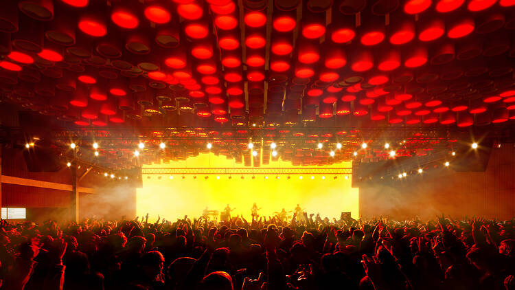 Render of huge room of people dancing with a ceiling of red lights Render of huge room of people dancing with a ceiling of red lights